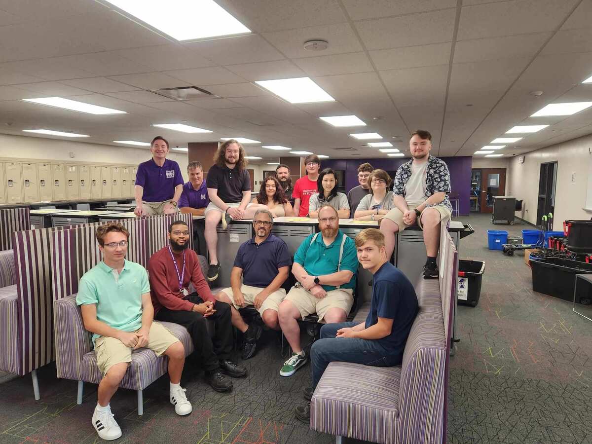 Group picture of technology department gathered in high school